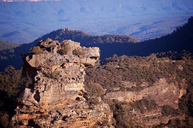 Weathered sandstone outcrops on an exposed ridge above the treeline